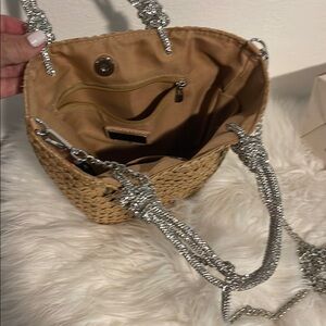Tan Woven Bag with Silver Chain and Flap Closure by Urban Expressions